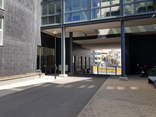 a building with a walkway in front of a building at Top-Floor One-Bedroom Flats - Peaceful with Ocean and City Views in Funchal
