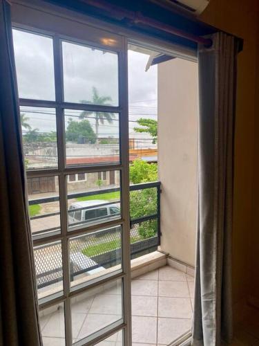 a room with a window with a view of a street at Amplio Departamento Céntrico in Formosa
