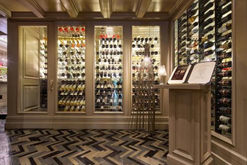 a wine shop with a large display of wine bottles at Four Seasons Hotel Mexico City in Mexico City