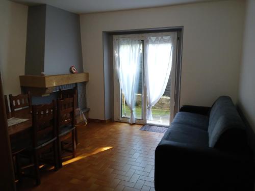Χώρος καθιστικού στο Agréable appartement de 80M2 dans Maison