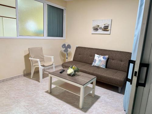 Et opholdsområde på Apartamento Anau- Playa - Yumbo