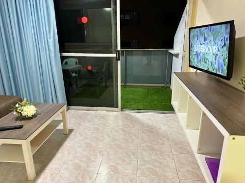 Et tv og/eller underholdning på Apartamento Anau- Playa - Yumbo