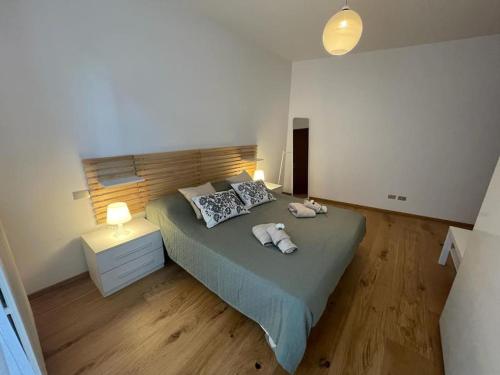 Ένα ή περισσότερα κρεβάτια σε δωμάτιο στο La Corte di Aurius