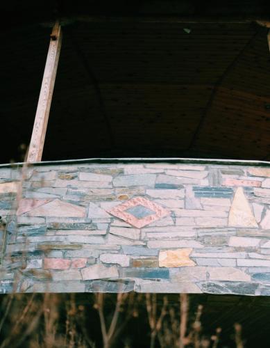 a stone wall with a painting on it at Vila Elati Oreini Korinthia in Velína