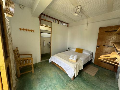Voodi või voodid majutusasutuse Cabaña Punta Coral toas