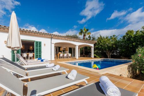 an image of a villa with a swimming pool at Casa Colom in Portocolom