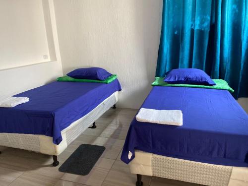 Ένα ή περισσότερα κρεβάτια σε δωμάτιο στο Apartamento Garden para 7 a 8