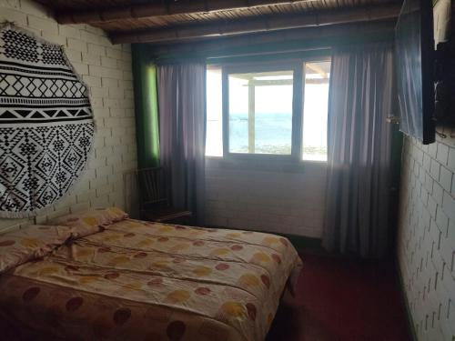 Кровать или кровати в номере Beach House SantaElena