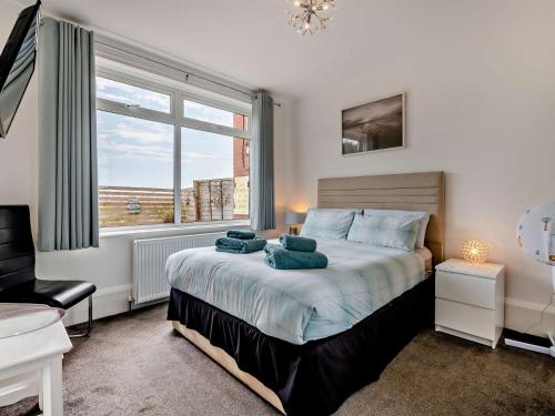 Ένα ή περισσότερα κρεβάτια σε δωμάτιο στο 2 Bed in Filey 77711