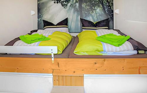 Ένα ή περισσότερα κρεβάτια σε δωμάτιο στο Ferienhaus Ueckermünde Seebad