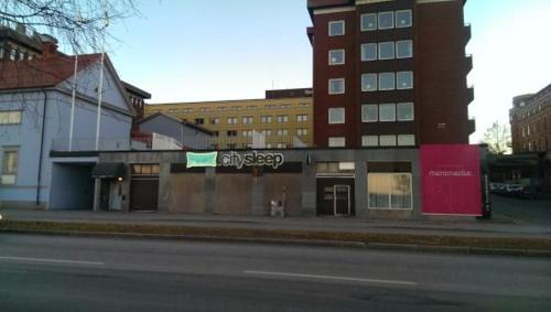 a building on the side of a city street at Citysleep in Luleå