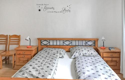 Ένα ή περισσότερα κρεβάτια σε δωμάτιο στο Ferienwohnung Mirow Roggentin