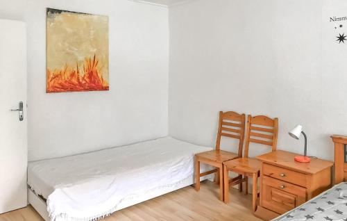 Ένα ή περισσότερα κρεβάτια σε δωμάτιο στο Ferienwohnung Mirow Roggentin