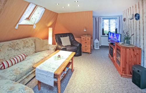 TV a/nebo společenská místnost v ubytování Ferienwohnung Waren Müritz