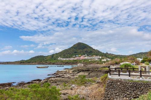 a bench on the shore of a body of water at Jhai Wu in Kenting