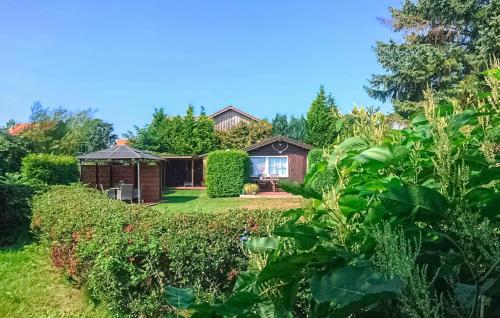 a house in the middle of a garden at Ferienhaus Dabel in Dabel