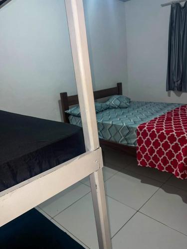 Postel nebo postele na pokoji v ubytování Nativo Hostel