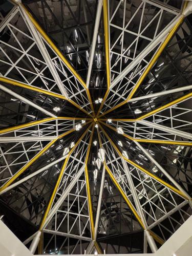 a large ceiling with yellow and white metal at S3 Ayutthaya Hotel in Phra Nakhon Si Ayutthaya