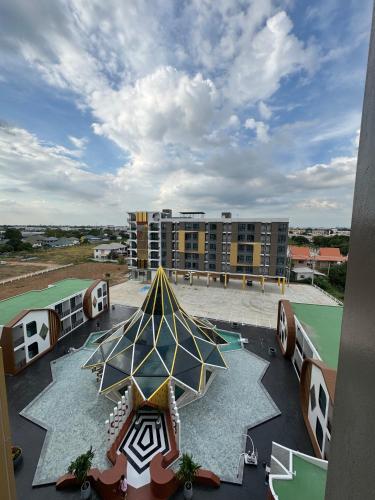 a view of a building with a tent on the roof at S3 Ayutthaya Hotel in Phra Nakhon Si Ayutthaya