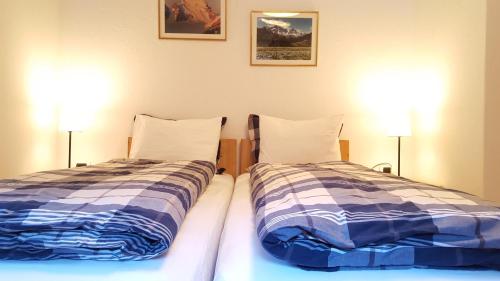 Letto o letti in una camera di Casa Alfredino