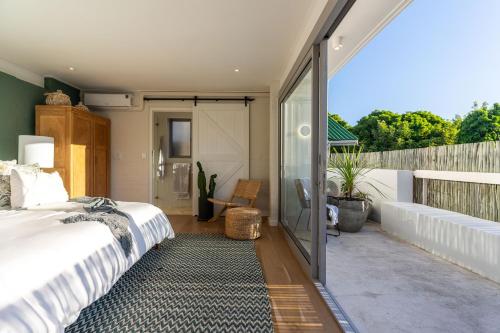 Voodi või voodid majutusasutuse Boutique Coastal Retreat toas