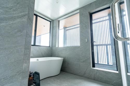Ein Badezimmer in der Unterkunft みらいステイKawachi