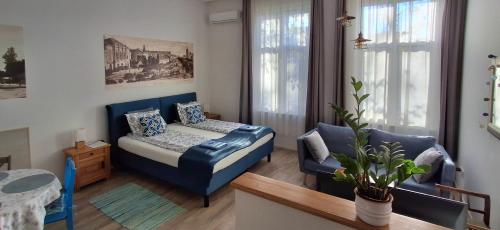 Posteľ alebo postele v izbe v ubytovaní M37 Apartman