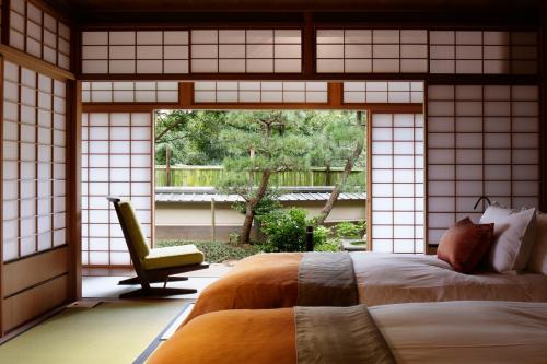 Postel nebo postele na pokoji v ubytování THE HIRAMATSU HOTELS & RESORTS ATAMI