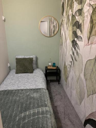Postel nebo postele na pokoji v ubytování SheSpace Apartrooms