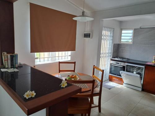 Cuina o zona de cuina de Sunshine Beach Villa