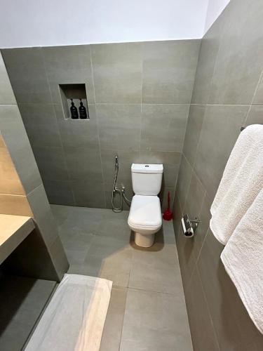 Koupelna v ubytování Reef Bungalow Hotel