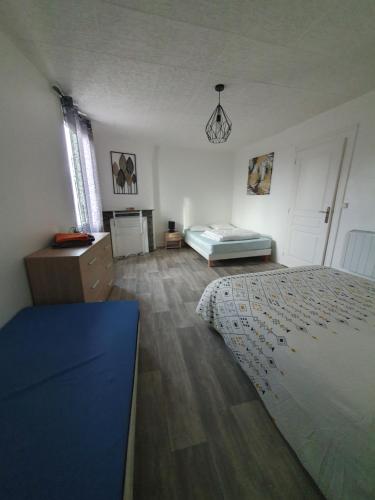 Postel nebo postele na pokoji v ubytování Nat'Autry