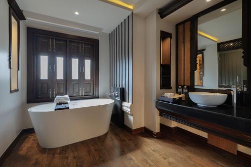 Ένα μπάνιο στο Akira Thaphae Hotel