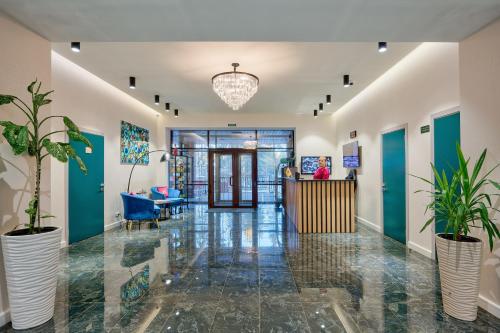 Лобби или стойка регистрации в Aisha Bibi Hotel & Spa Burabay