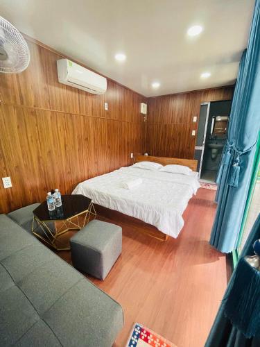 Ένα ή περισσότερα κρεβάτια σε δωμάτιο στο Cat Tien River Lodge