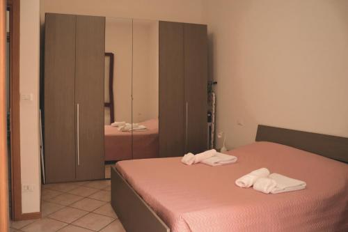 En eller flere senge i et værelse på casa vacanze medicina 3