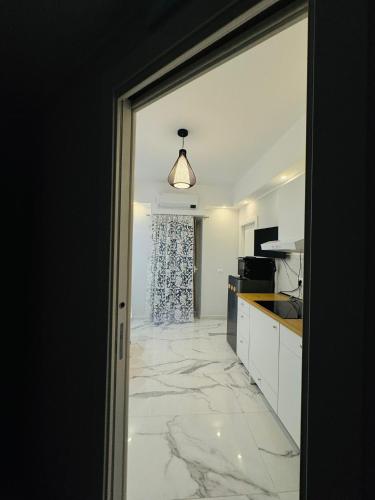 Dapur atau dapur kecil di Limoni Inn Messina