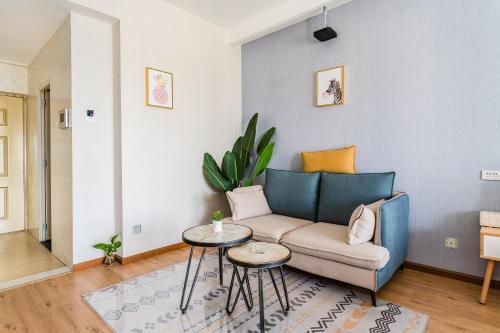 Un lugar para sentarse en Kunming Qicaimen Shangpin Apartment