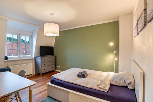 Ένα ή περισσότερα κρεβάτια σε δωμάτιο στο Unterkunft Brötzingen