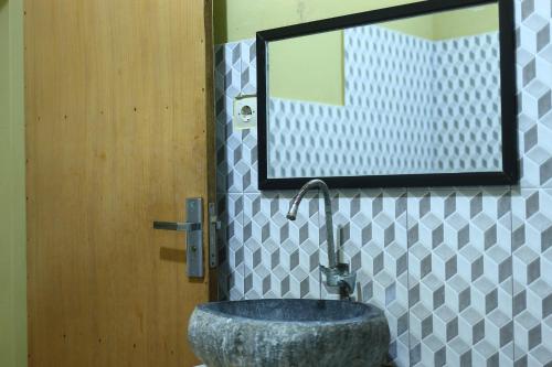 Ένα μπάνιο στο Three V Homestay