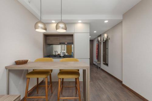 Kuchyň nebo kuchyňský kout v ubytování Wyn Residence Batumi