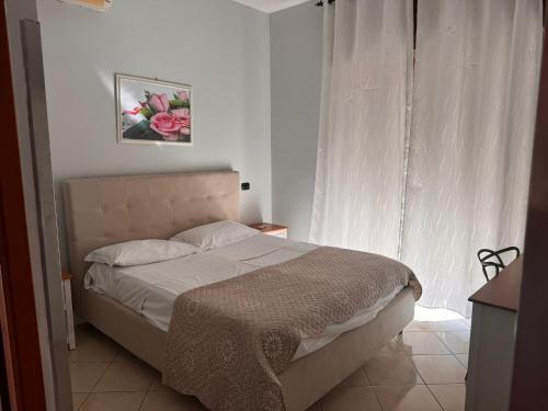 Postel nebo postele na pokoji v ubytování Hotel VistaMare
