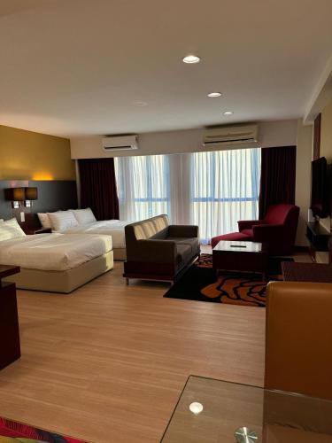 Katil atau katil-katil dalam bilik di Ty Suite Studio at Ming Garden Residence