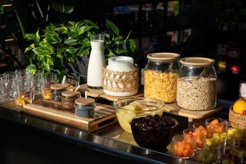 a display of food items on a counter at Club del Sole Pini Boutique Resort in Punta Marina