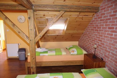 a room with two bunk beds in a building at Ubytování a apartmány Sluníčko in Lomnice nad Lužnicí