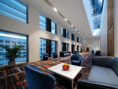Posezení v ubytování Sanya Phoenix Airport Hotel