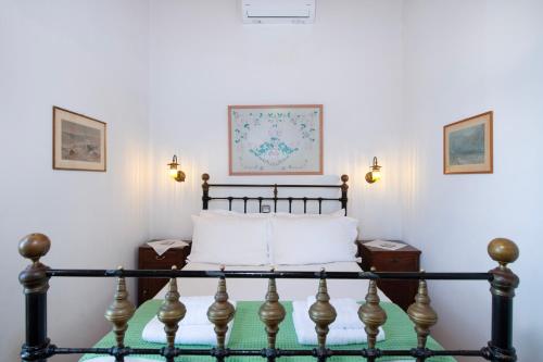 Ένα ή περισσότερα κρεβάτια σε δωμάτιο στο Ismini Apartments