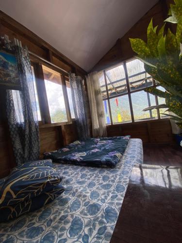 Postel nebo postele na pokoji v ubytování Tongdenlee homestay