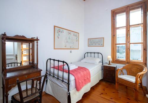 Ένα ή περισσότερα κρεβάτια σε δωμάτιο στο Ismini Apartments