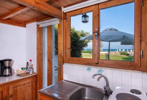 Η κουζίνα ή μικρή κουζίνα στο Ismini Apartments
